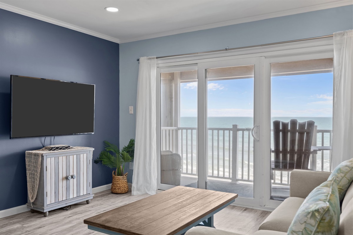 Sliding doors keep the ocean in view from every seat