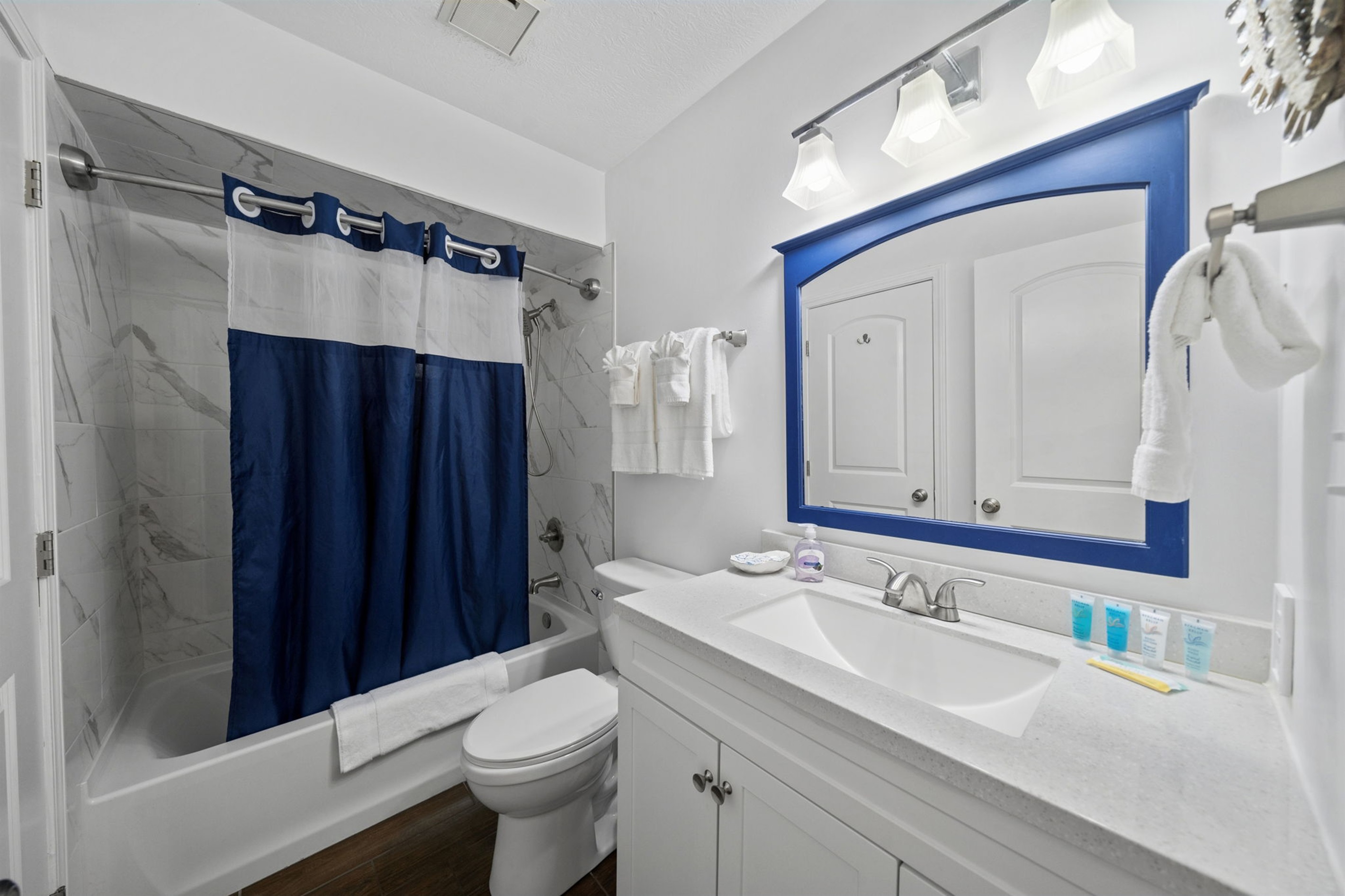 Guest bathroom with upgraded tub/shower combination