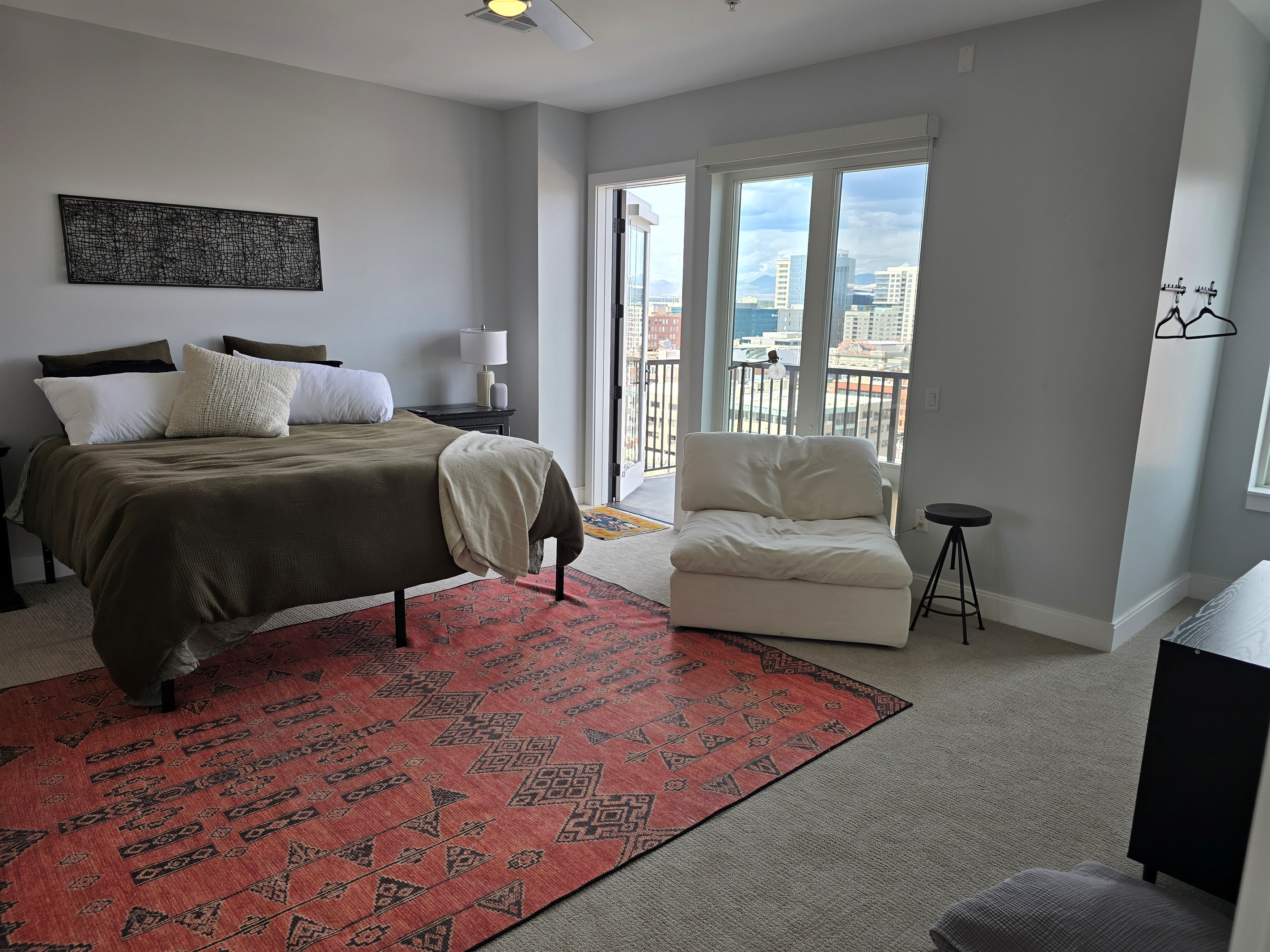 King size bed, extra seating area, private balcony with seating.