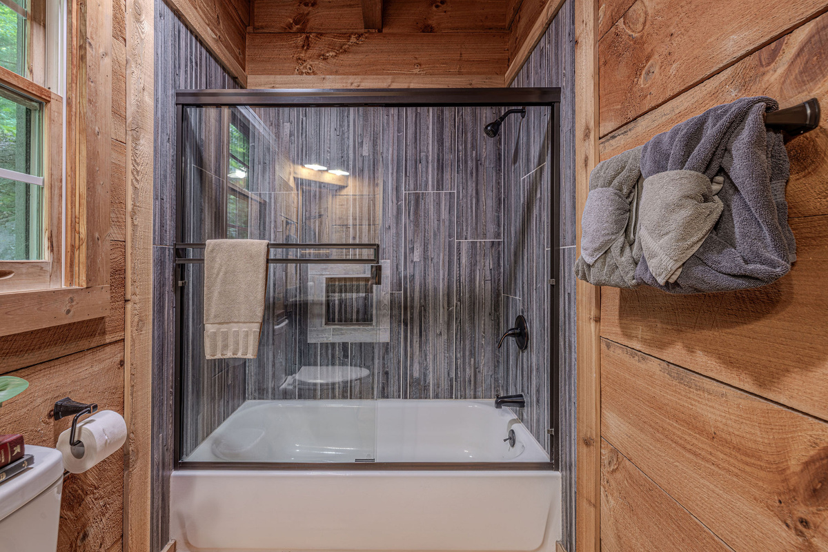 Full tub and a walk-in shower waiting for you.