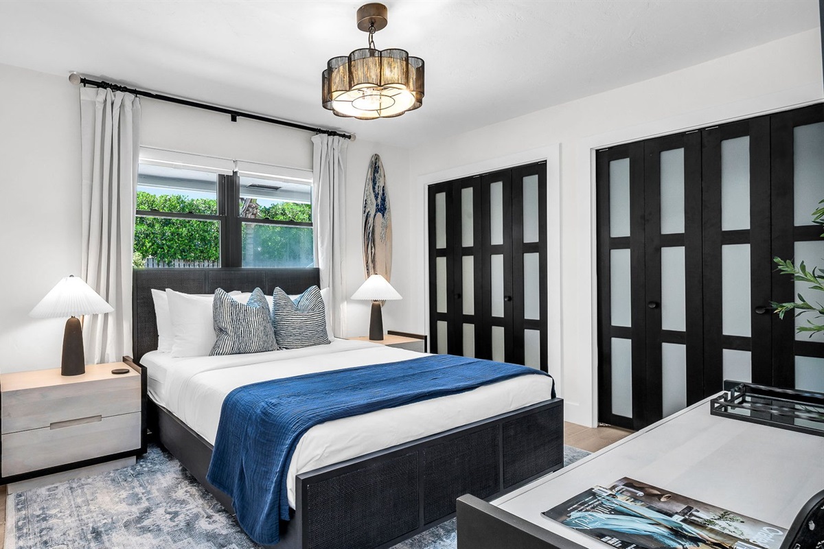 Designed for both style and comfort, this queen retreat blends chic coastal décor with sleek modern touches. With loads of closet space and a Smart TV for streaming, it’s perfect for unwinding after a day at the beach.