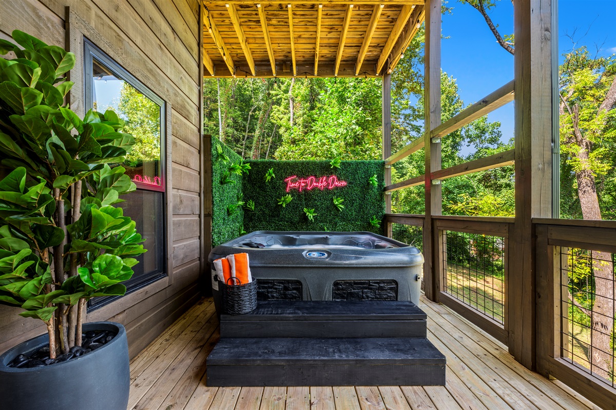 🛁 Soak under the trees with our iconic "Time to Double Down" neon glowing in the background. It’s a mood, a vibe, a whole thing.
