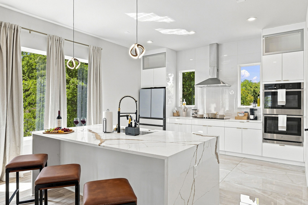 Bright and airy space with elegant counters, perfect for culinary adventures!