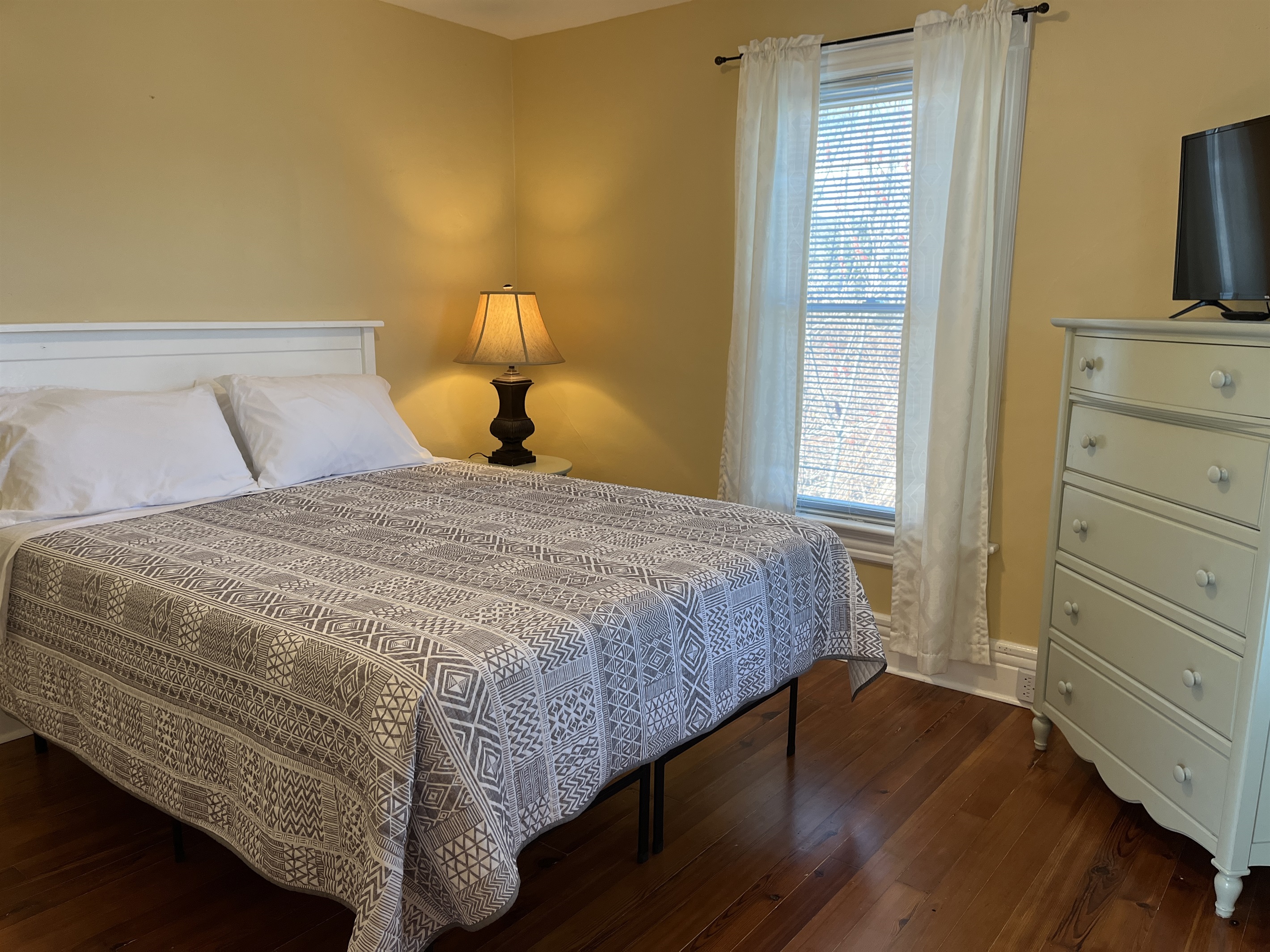 Cooperstown Cottage queen bedroom #3 with smart TV.