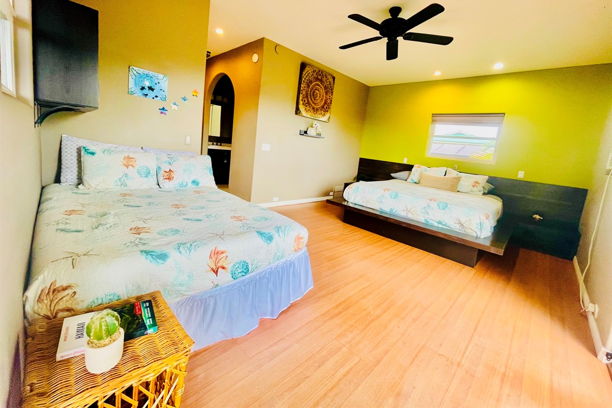 Bedroom 1 with one king bed and one twin bed