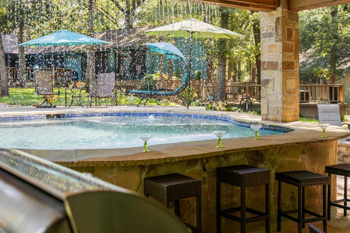 One of the most unique features of the pool is the beautiful rain curtain that flows gently over the swim-up bar. It’s not only a stunning visual, but also a fun splash zone for the kids.