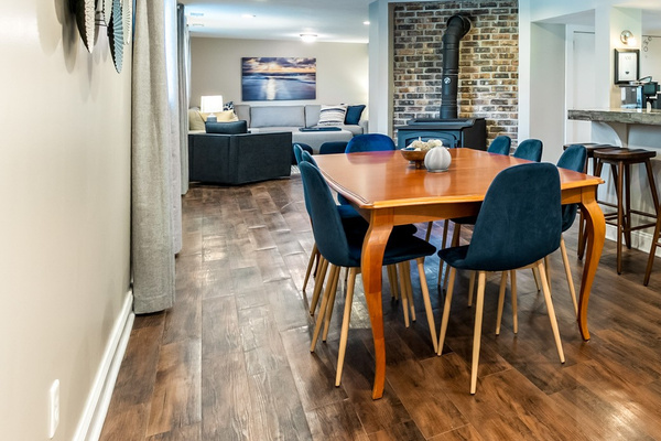 The perfect open-concept retreat. Step straight from your private entrance into a beautifully updated, fully self-contained dining and living area designed for easy relaxation.