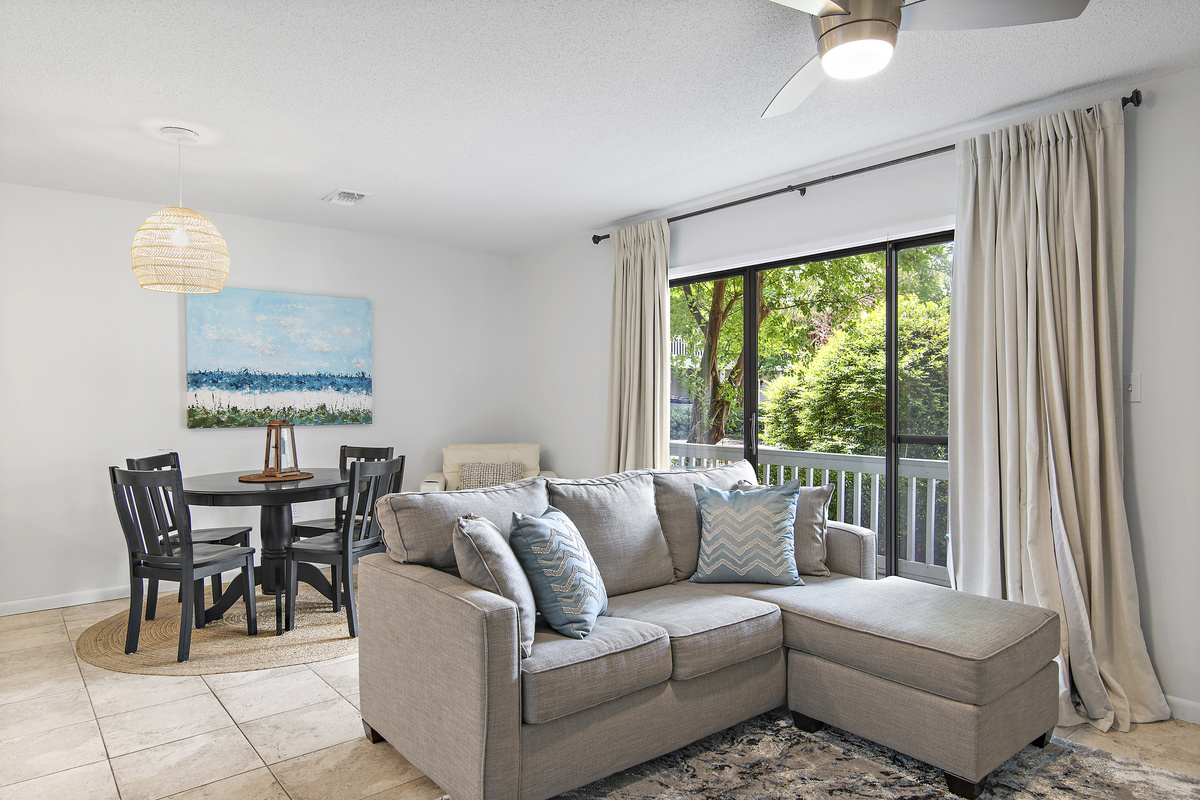 Living and dining, looking out to the porch
