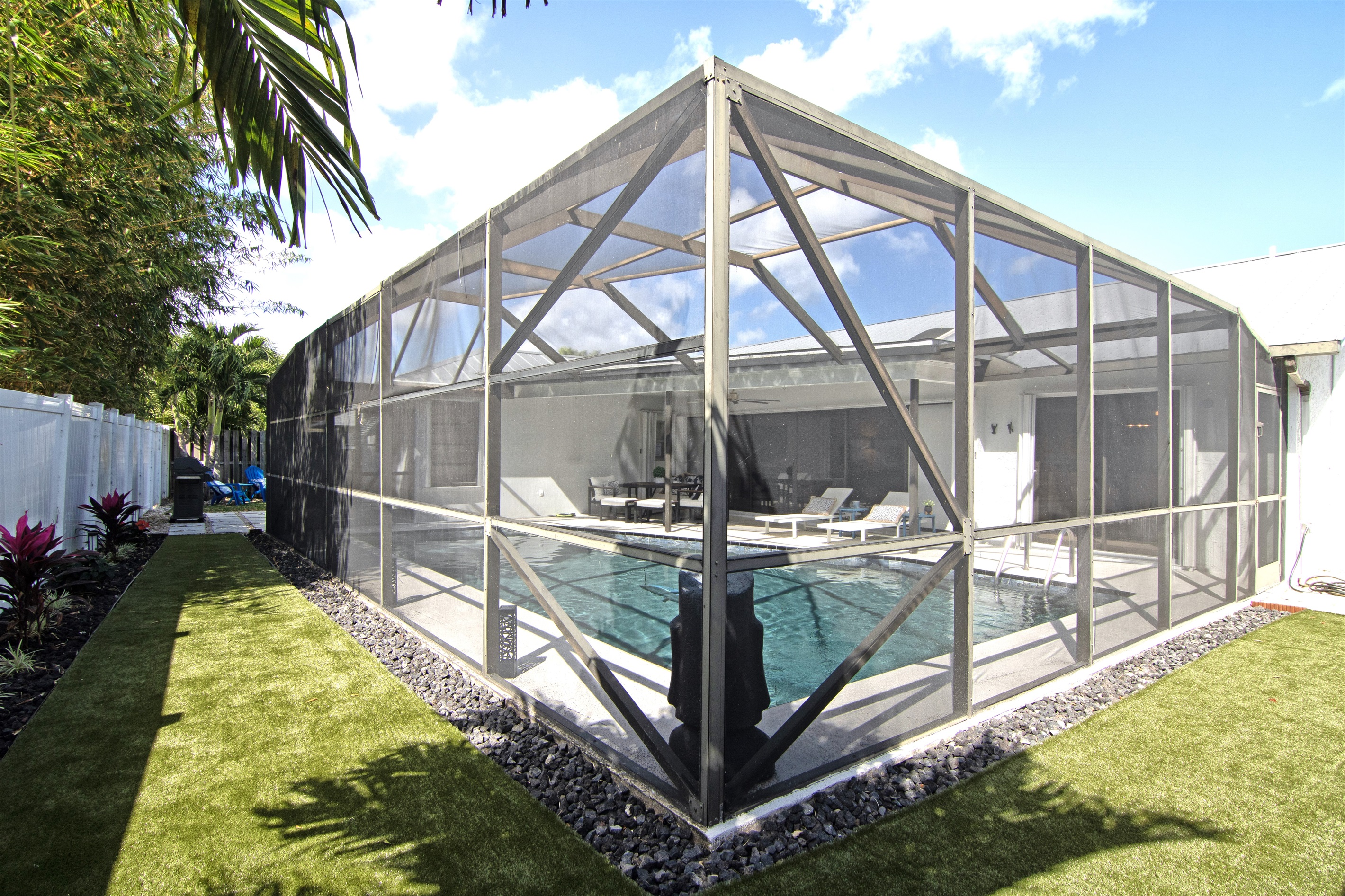 Turf green surounding the pool area