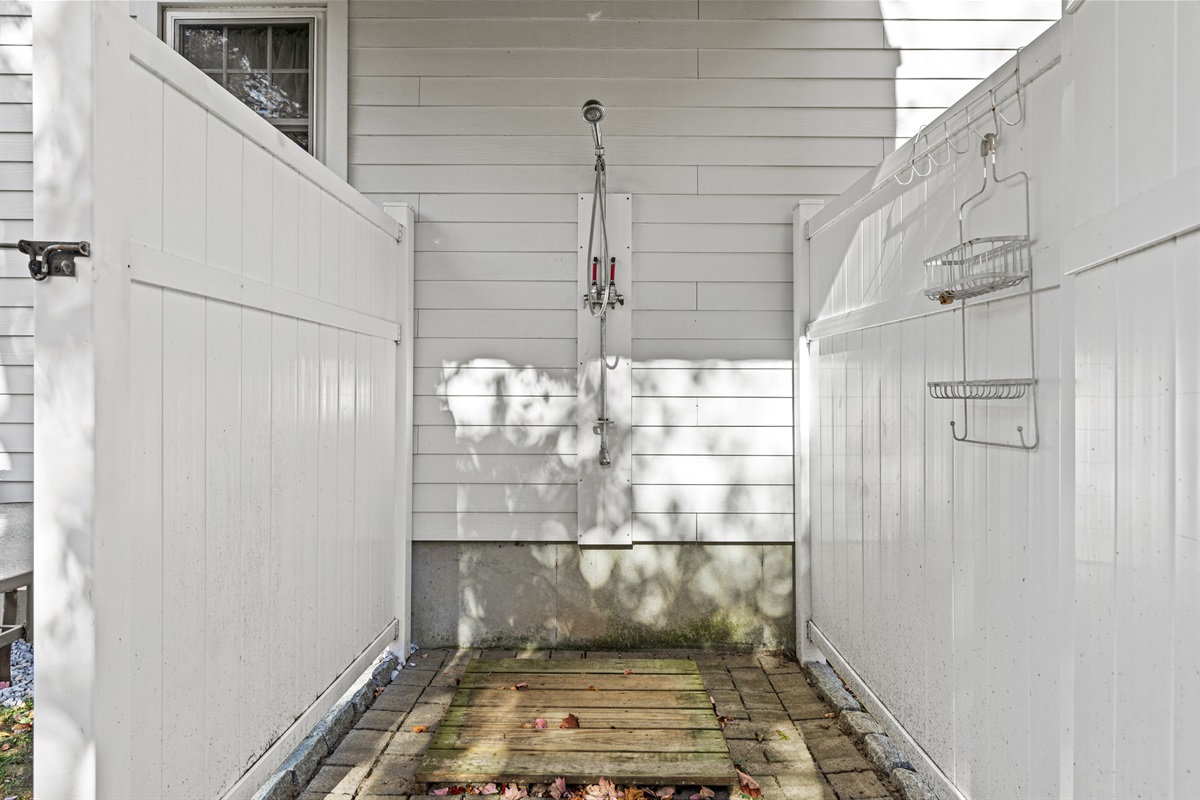 Enclosed outdoor shower