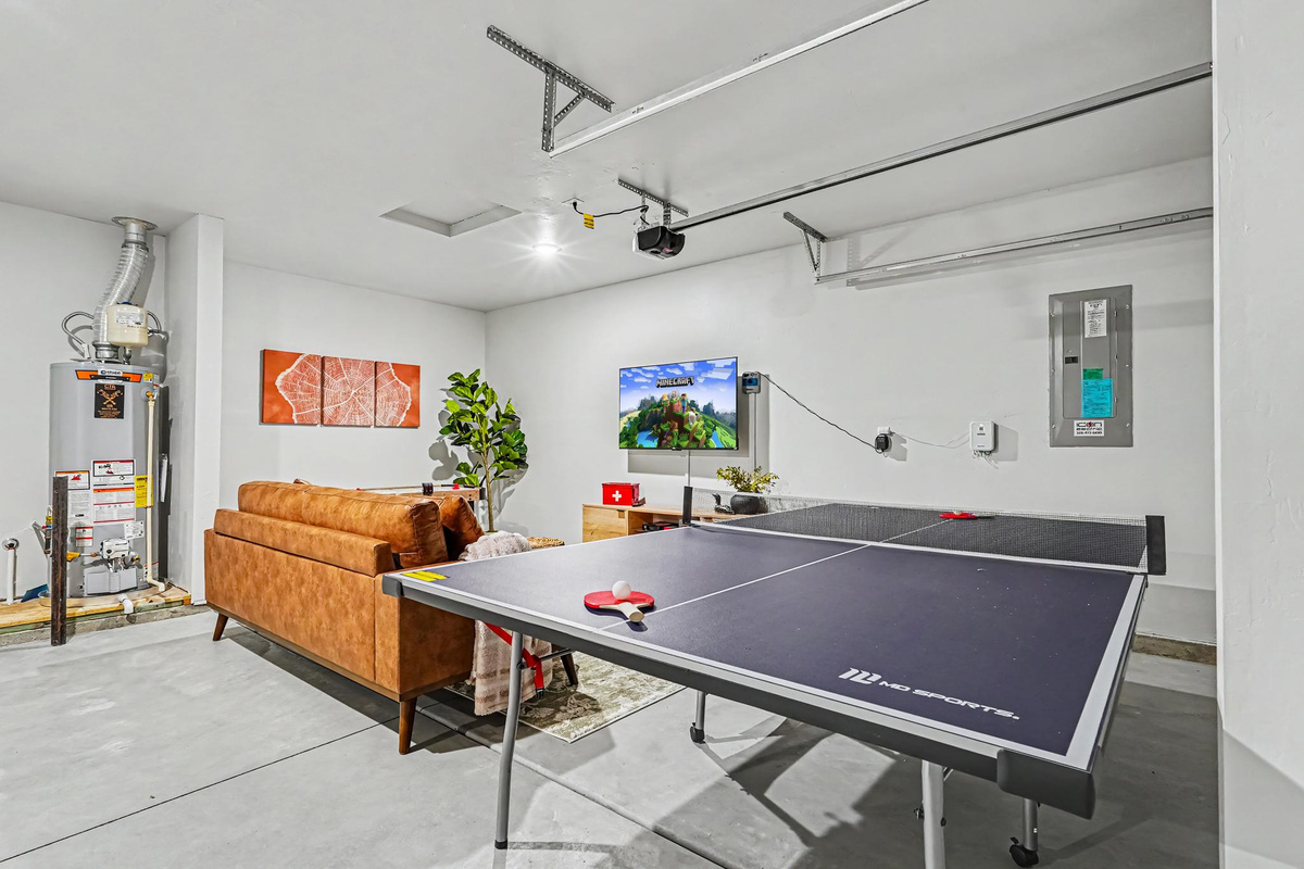 Enjoy the extra space this game room provides, perfect for friendly competition, family fun, and creating unforgettable memories!