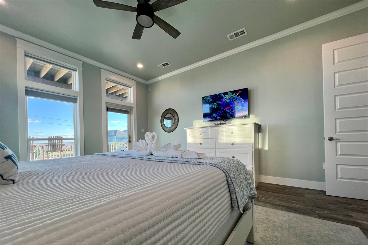 Crystal Paradise Primary Bedroom: Retreat to luxury in this primary king bedroom, where every detail is designed for comfort and relaxation, including a private ensuite bathroom and breathtaking ocean views that greet you each morning.
