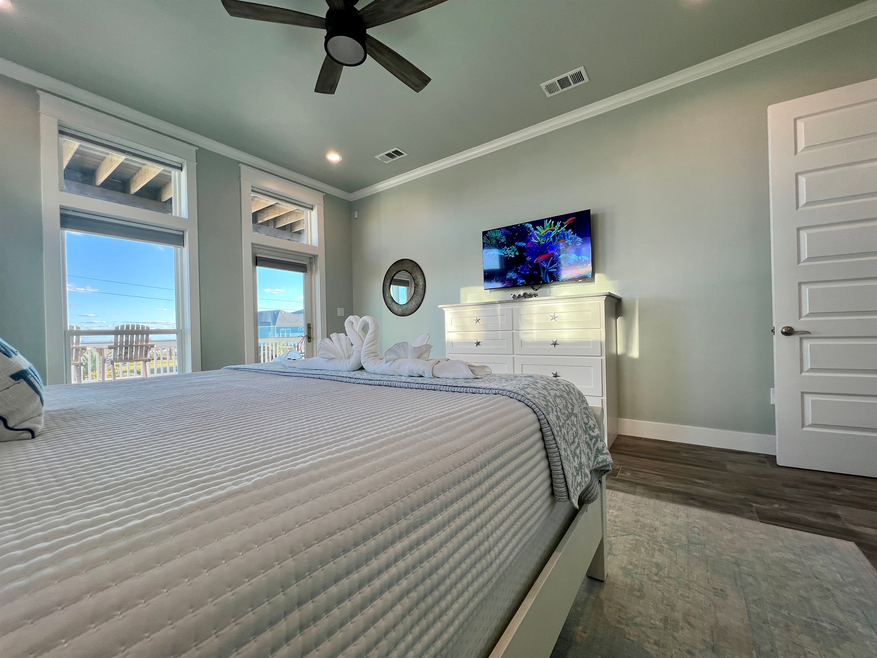 Crystal Paradise Primary Bedroom: Retreat to luxury in this primary king bedroom, where every detail is designed for comfort and relaxation, including a private ensuite bathroom and breathtaking ocean views that greet you each morning.