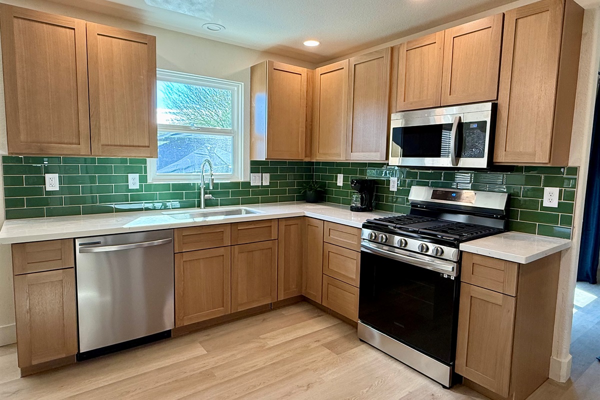 Just-remodeled, well-stocked kitchen. Ground coffee is provided for drip coffee maker.