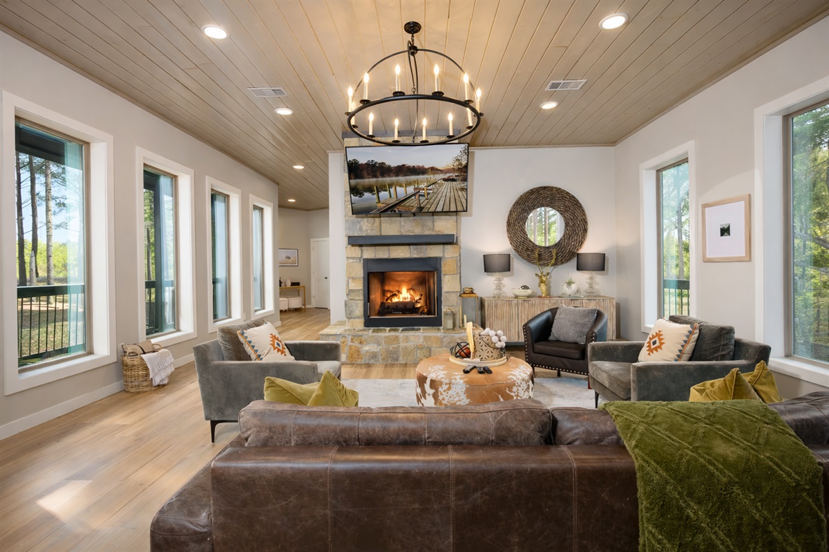 Another shot of the living room, this time giving a glimpse into the open concept common area to the home.