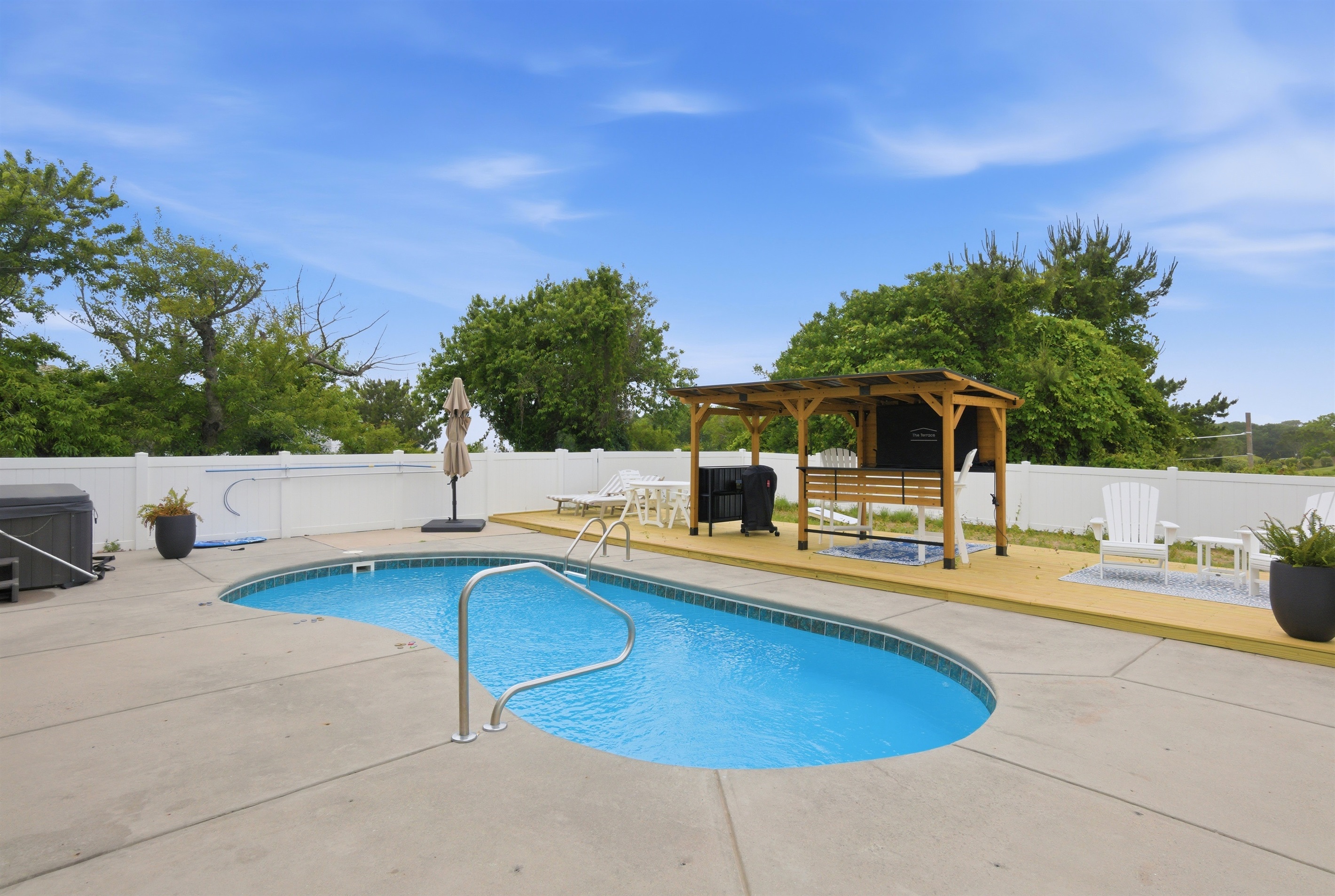 Sunny pool area perfect for cooling off and enjoying the outdoors.