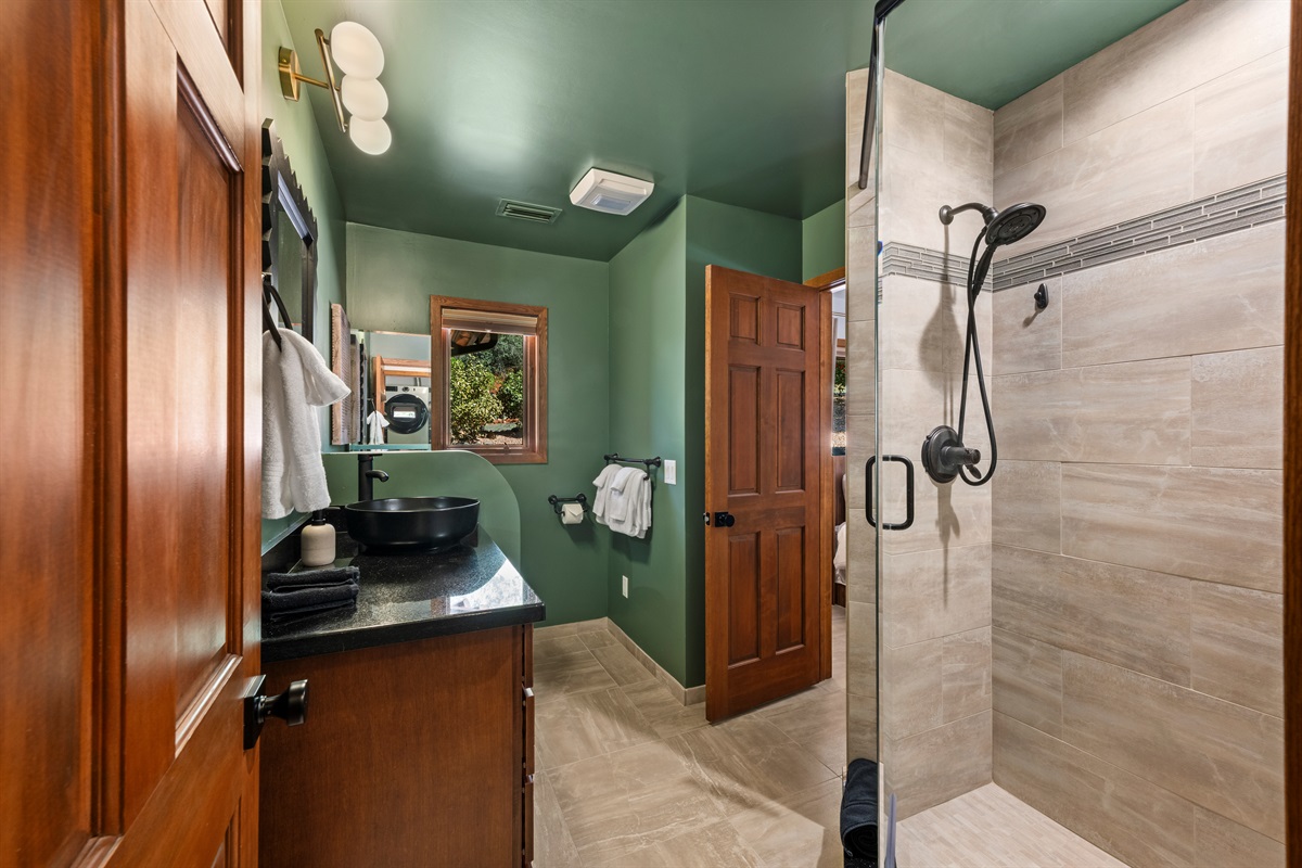 Bathroom 2
Comfort meets style with a walk-in shower and modern vanity.