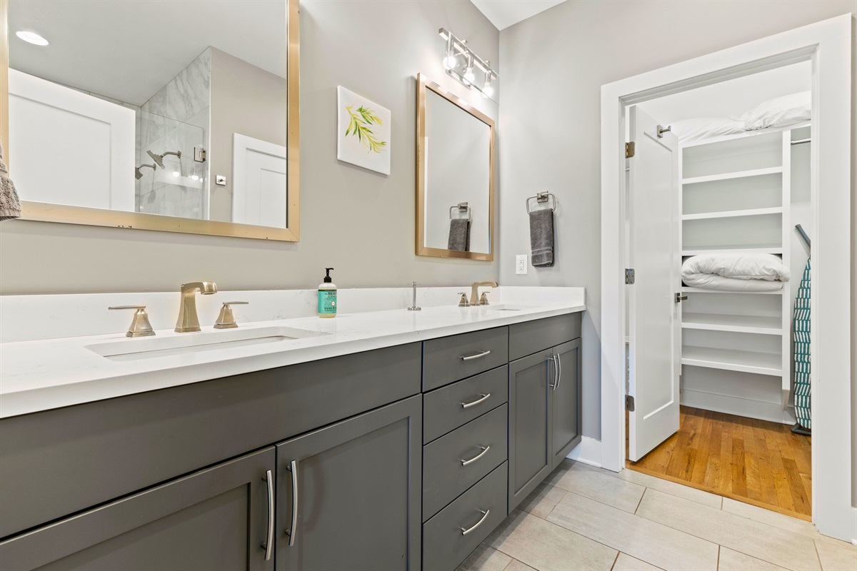 Discover extra space for getting ready at the expansive double vanity in this Casa Tiffani bathroom. You won’t lack for storage either thanks to the large walk-in closet.