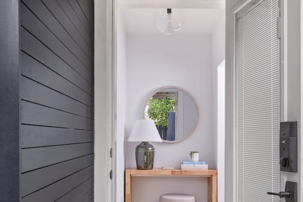 Welcome to Delray Beach! Step into the inviting entry hall and let your coastal getaway begin.