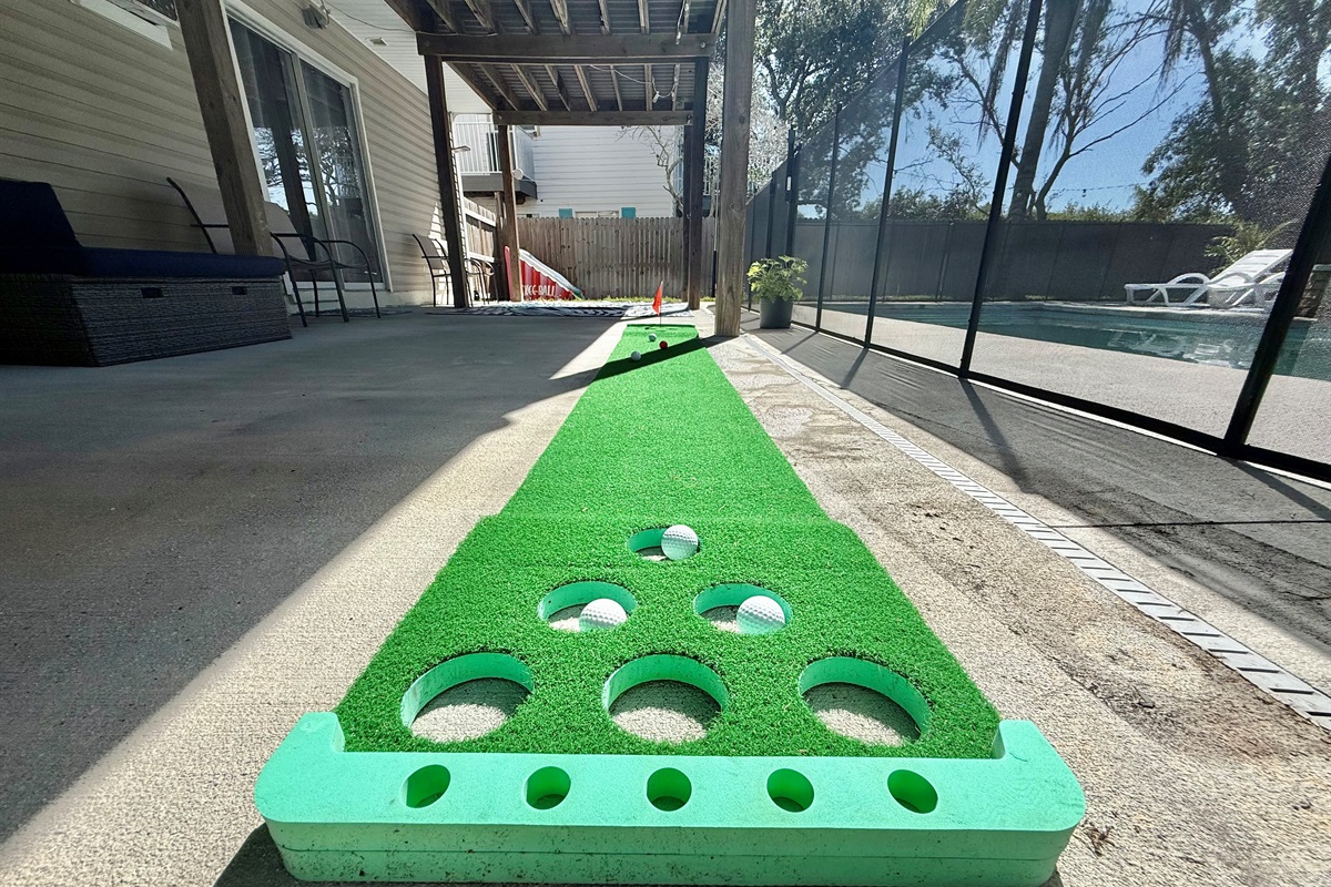 Challenge friends to mini-golf or cornhole steps away from the pool.