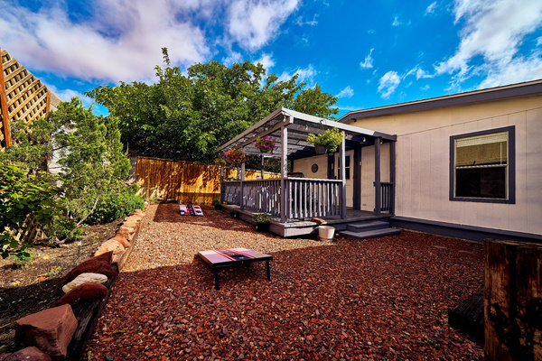 Backyard Patio and Garden feat. Cornhole and Darts