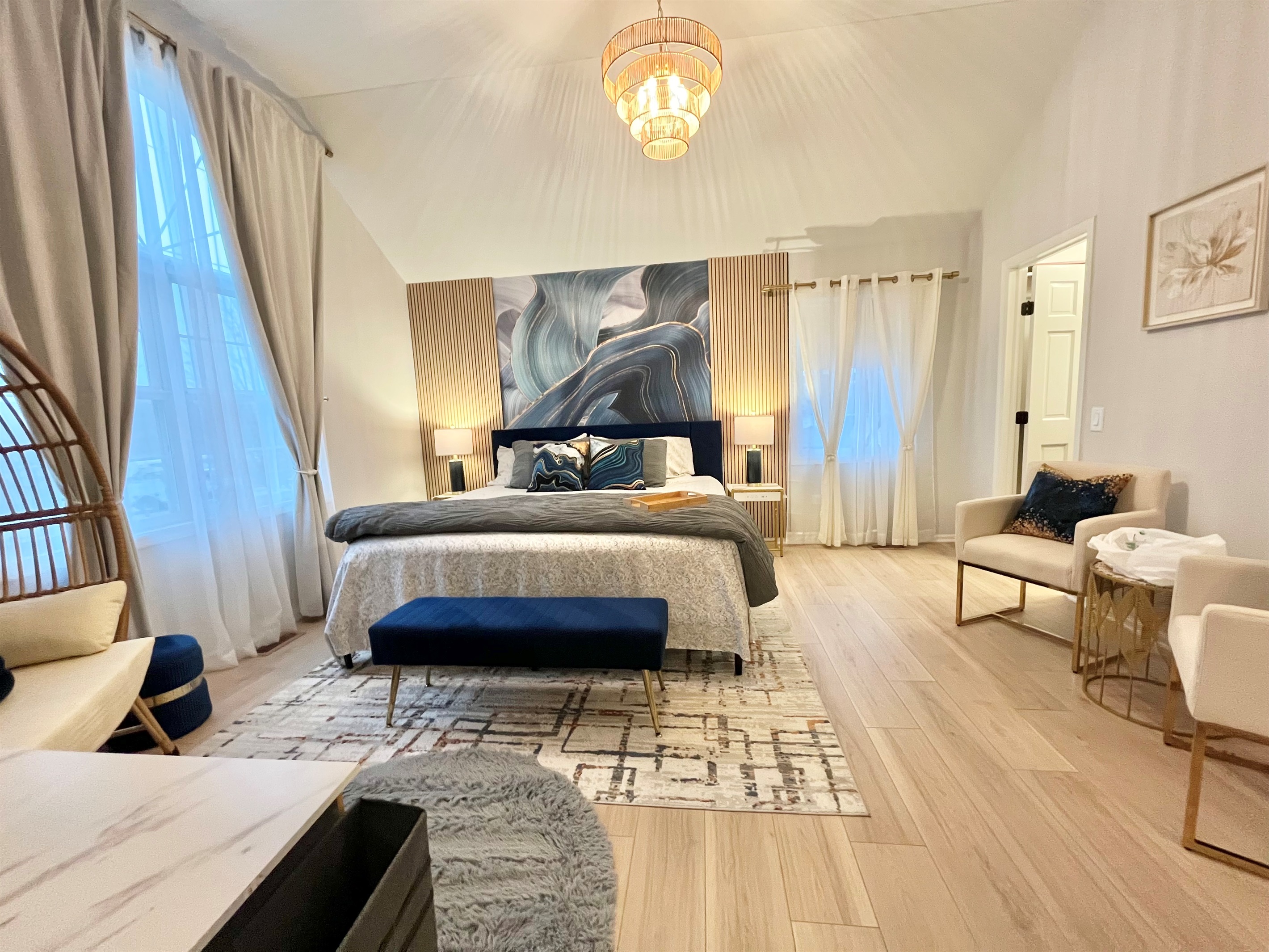 Beautiful master bedroom with king bed and  cathedral ceiling