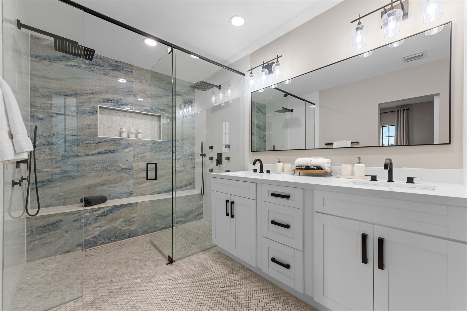🚿 Luxury spa vibes with a dual rainfall shower and double vanity setup.