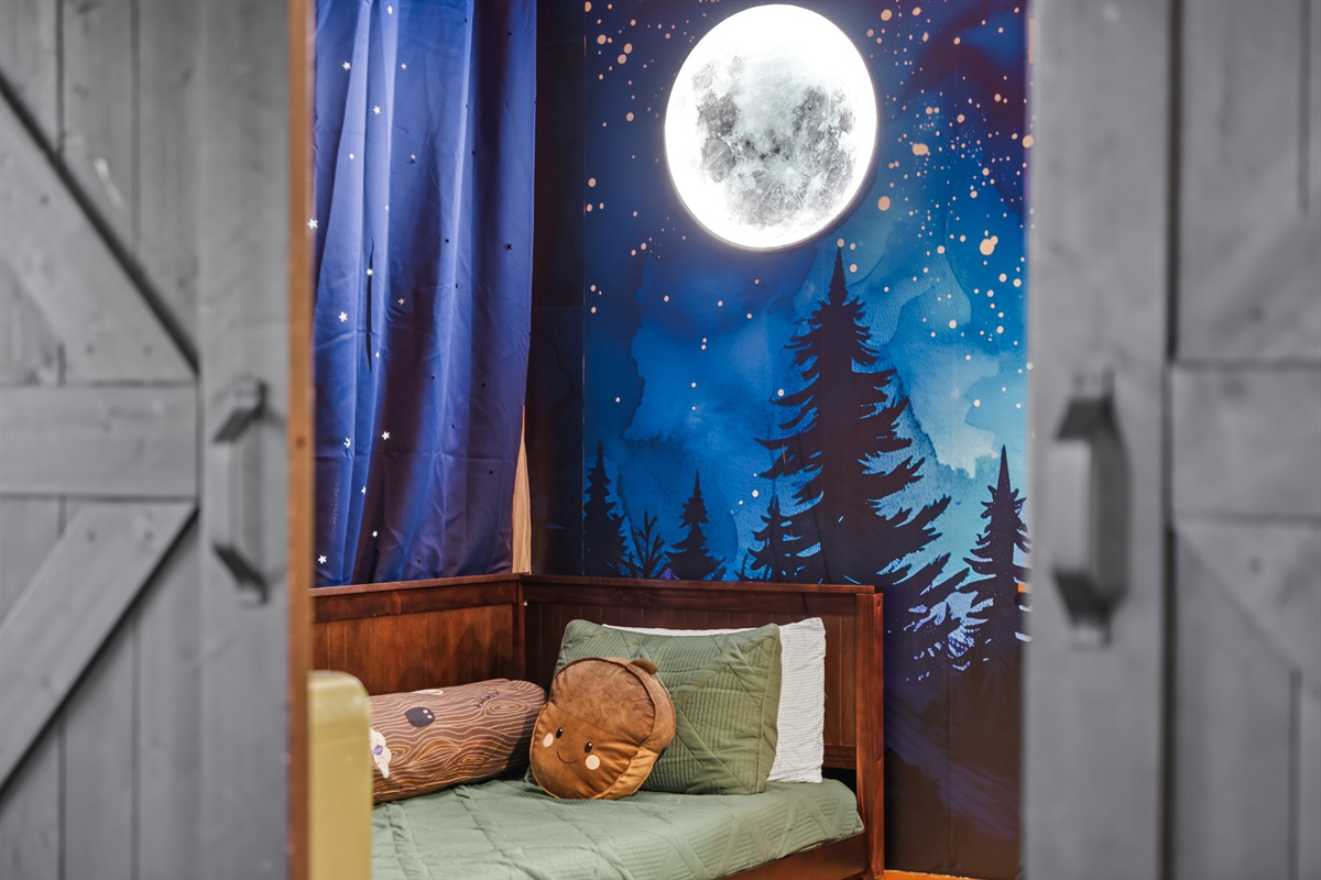 The bunk room has a twin XL over a queen bed and a separate twin daybed low to the ground that offer flexibility whether it's for younger kids or hangouts
