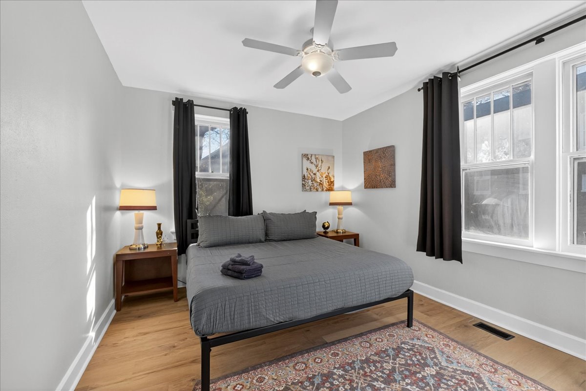 A second first-floor bedroom with a king bed.