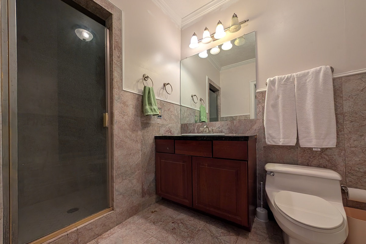Master bathroom with shower and bathtub