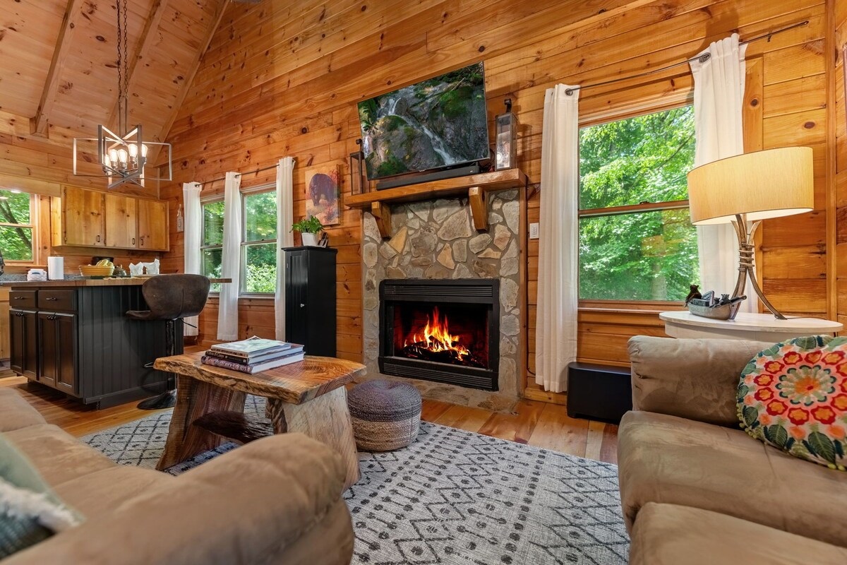 Living room with fireplace and plenty of seating to relax and enjoy company.