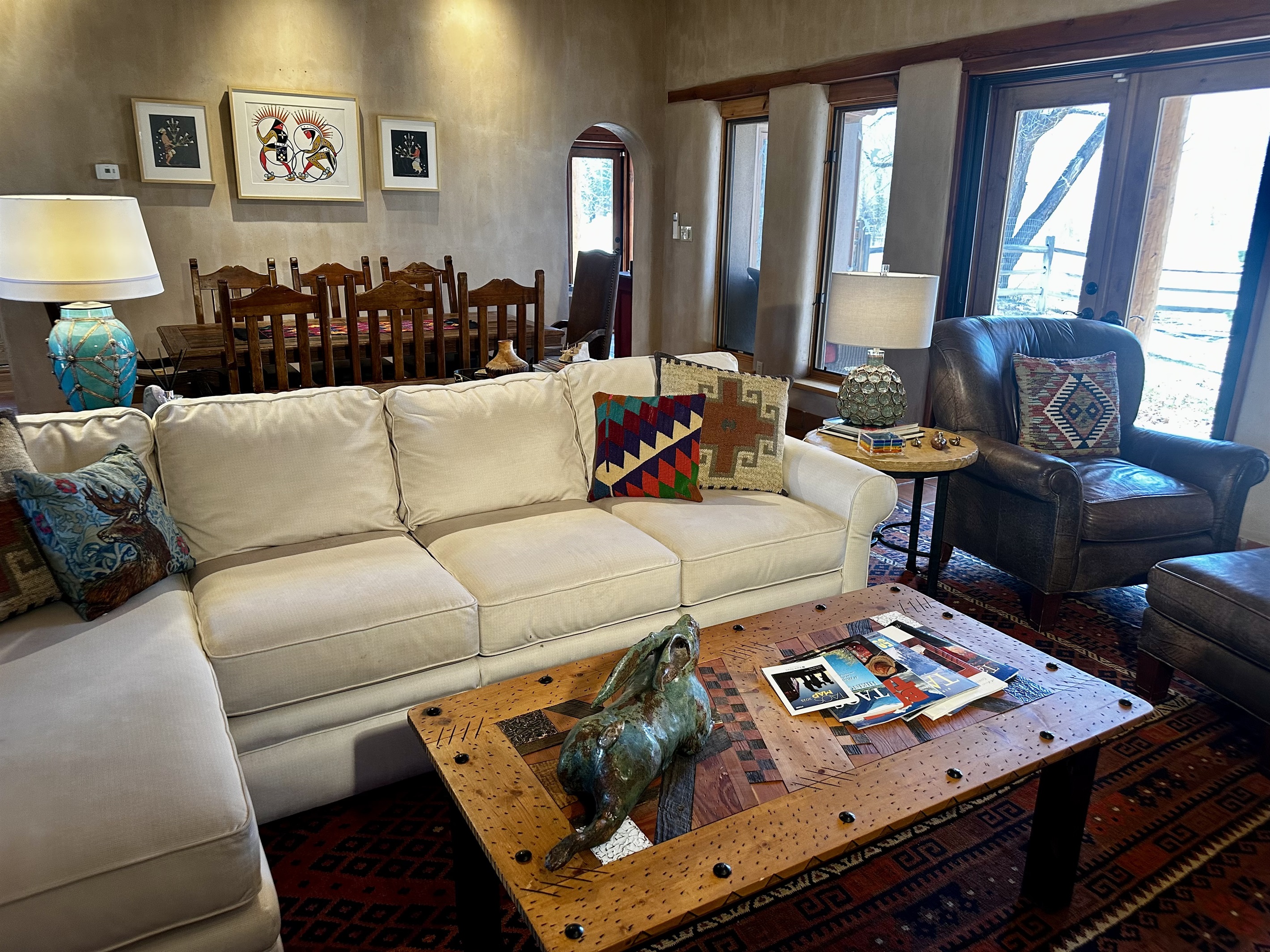 Comfy sectional and chair and half to enjoy the fire and TV