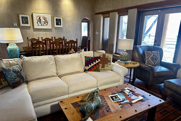 Comfy sectional and chair and half to enjoy the fire and TV