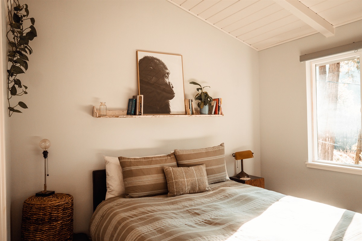 Master bedroom featuring a queen-sized bed dressed in crisp linens, your peaceful escape.