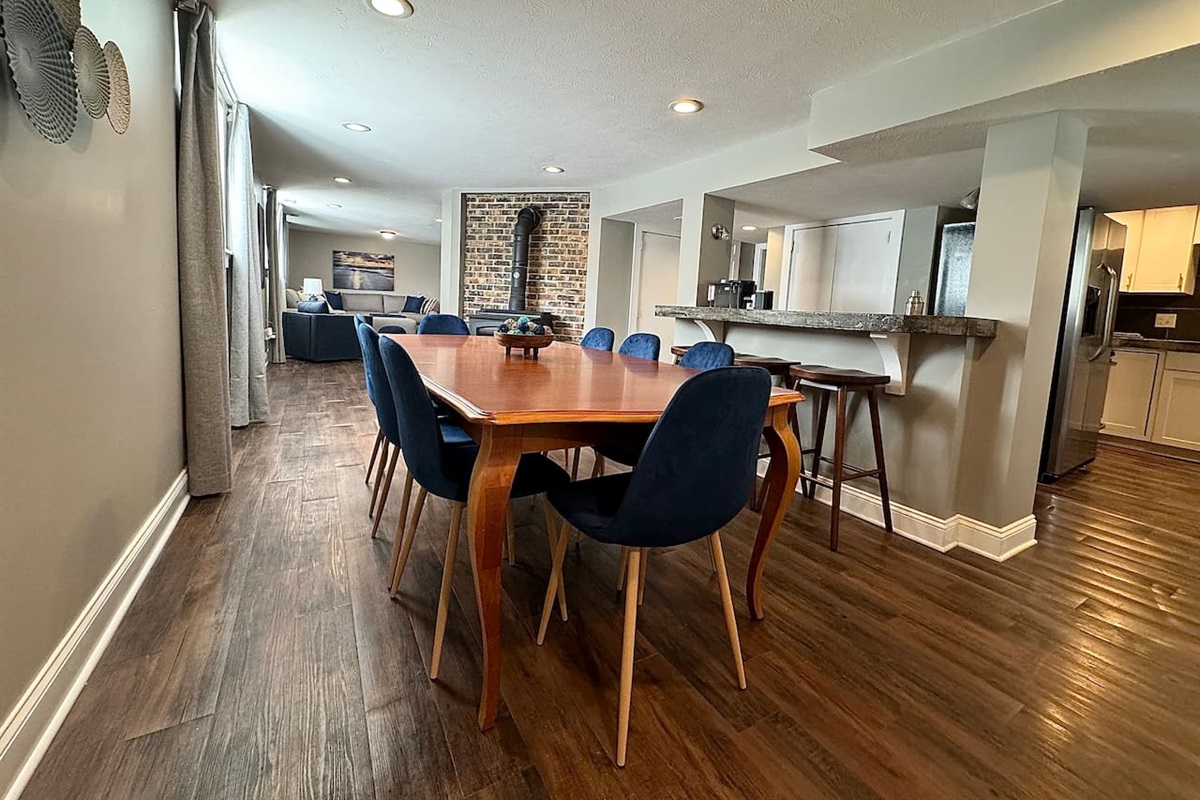 The Garden Level has an open concept with the Dining Area connecting to the Living Room and the Kitchen. 