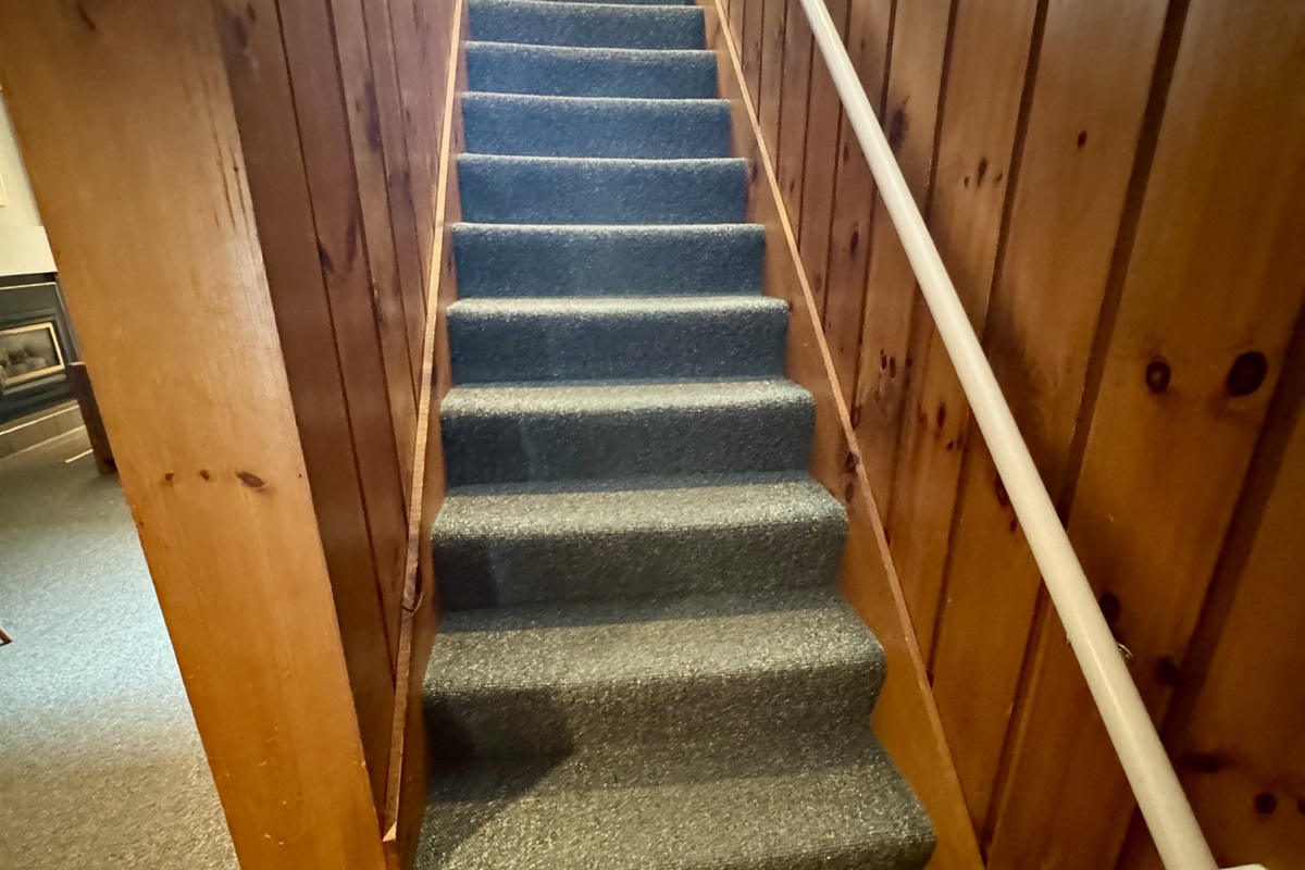 Stairs to bedrooms and bathrooms