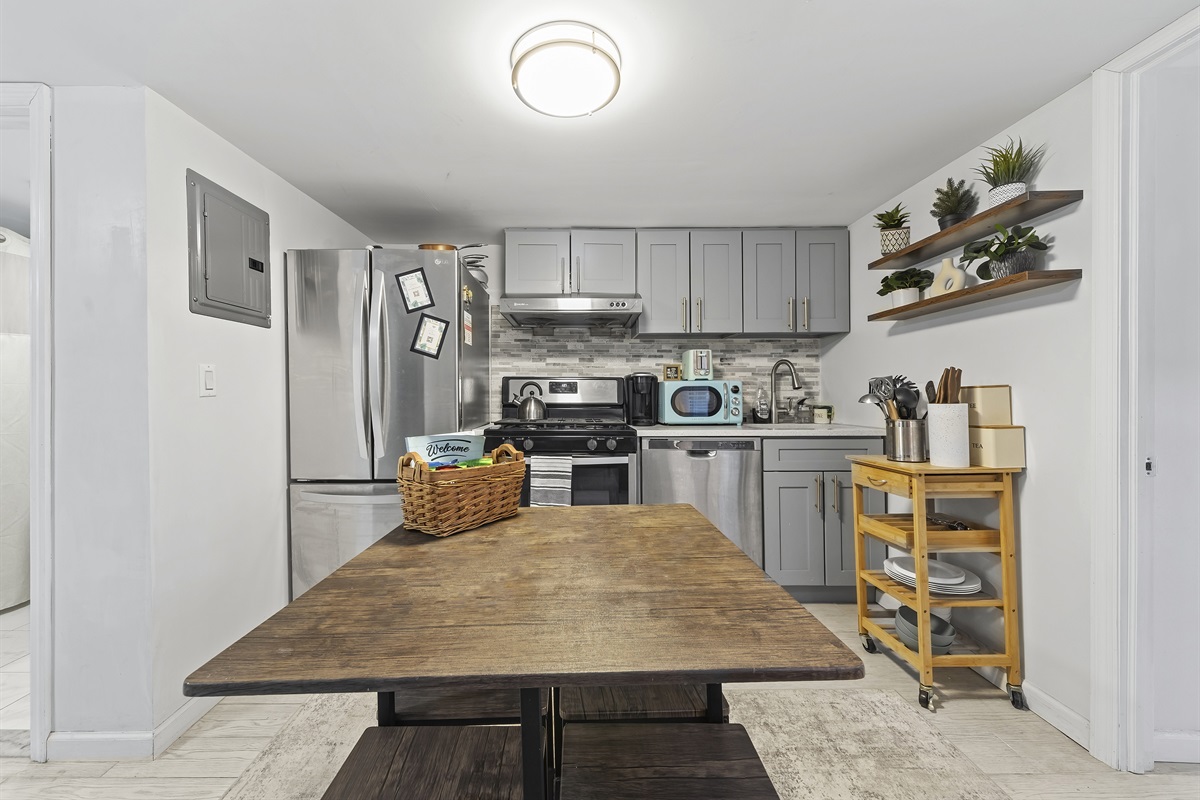 Cook with ease, share meals, and linger longer in this fully equipped kitchen designed for both quick bites and cozy dinners.