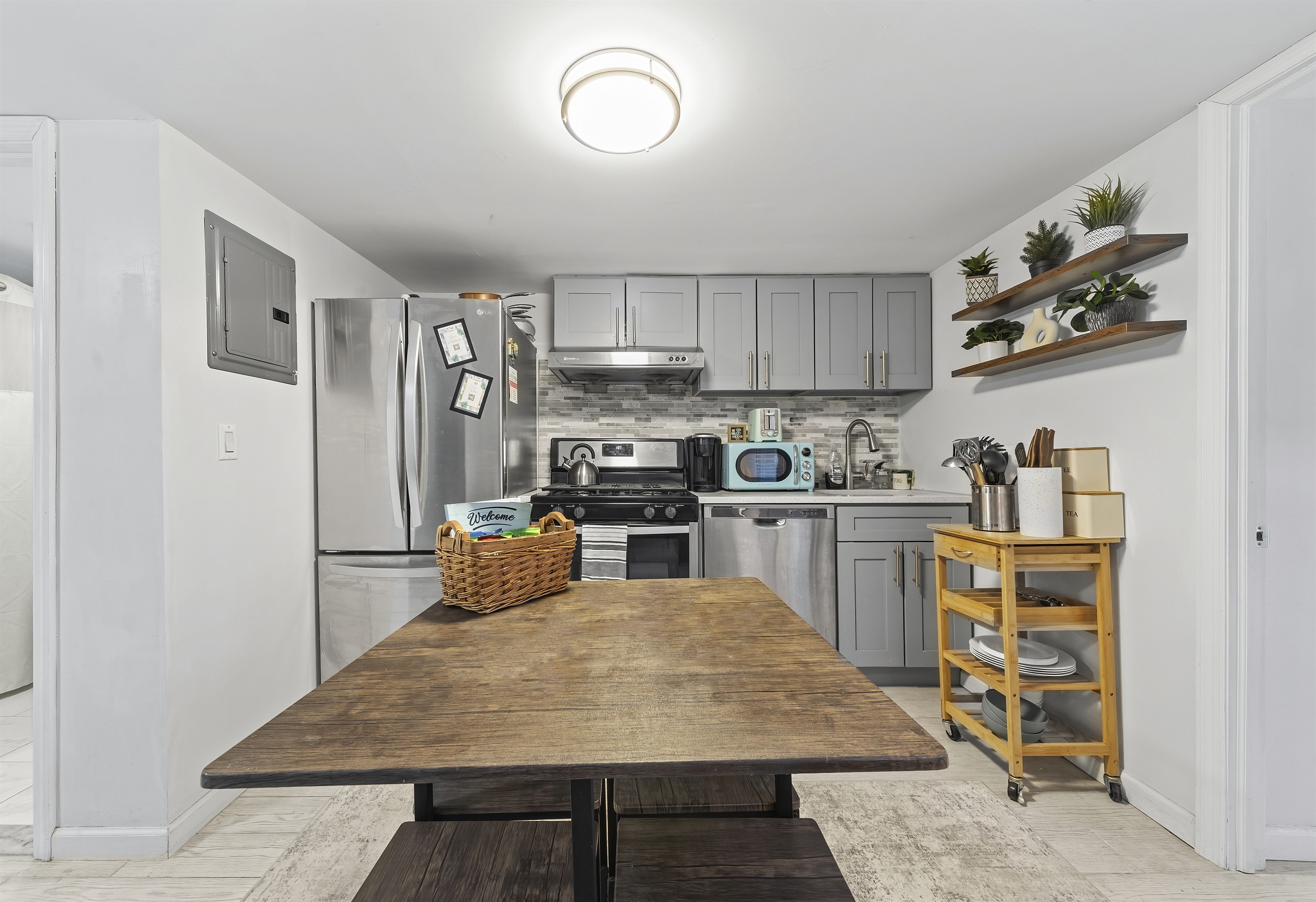 Cook with ease, share meals, and linger longer in this fully equipped kitchen designed for both quick bites and cozy dinners.