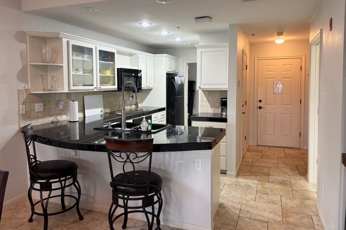 Large Fully Stocked Kitchen with Granite Counter Tops