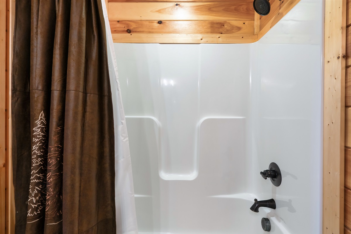 Clean and cozy bathroom perfect for a quick refresh or long soak.