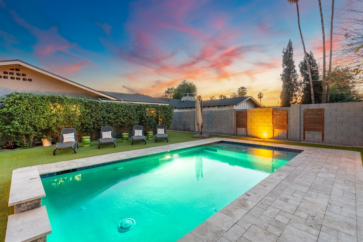 Refreshing backyard pool, offering a private oasis for swimming, relaxation, and outdoor enjoyment.