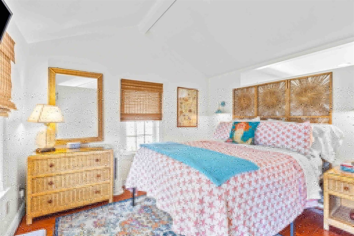The Main bedroom: queen bed with pillow top comfort. 6 pillows. Stand up fan.
