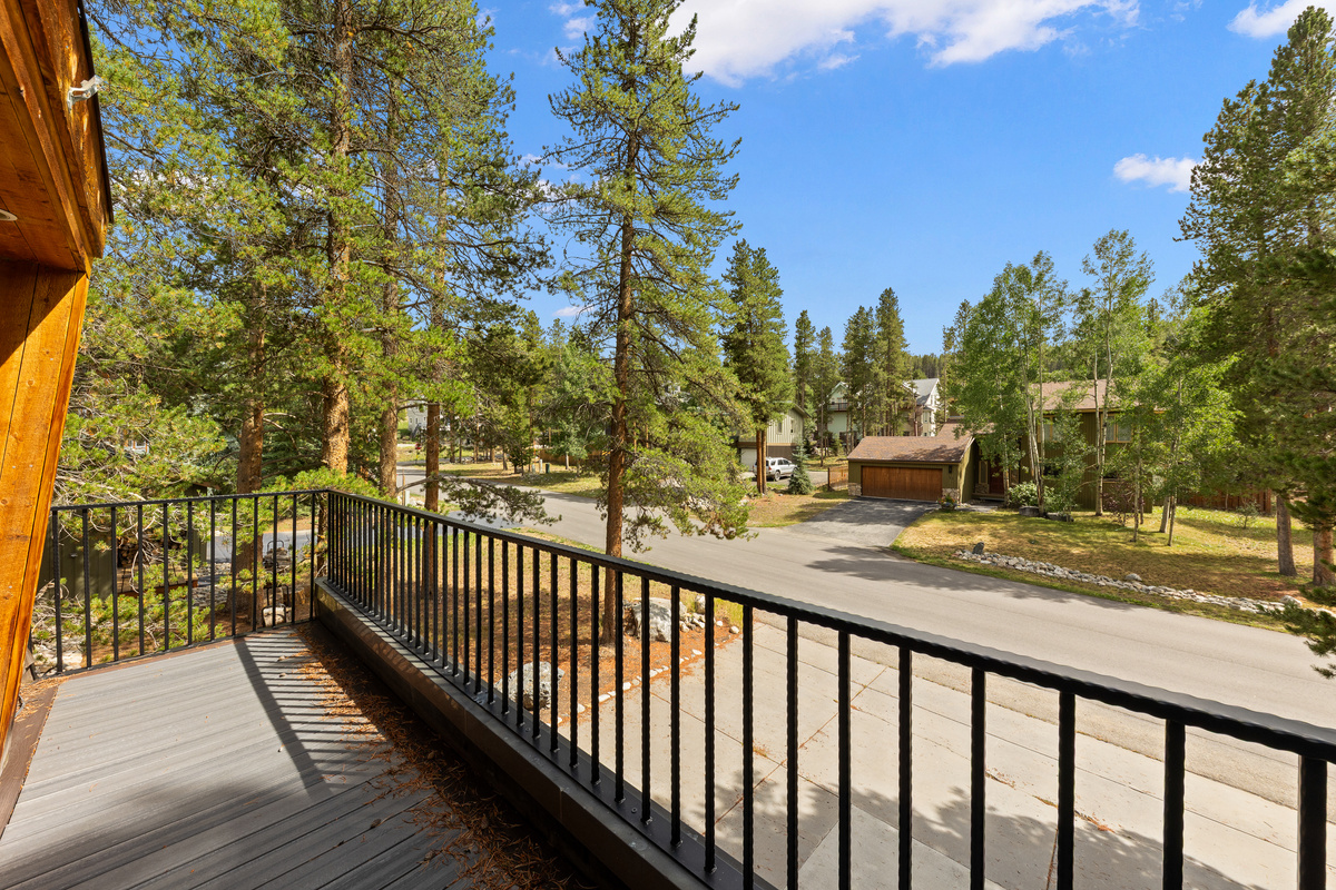 View from upper level junior primary suite. Arrow Darrow sits on a quiet street in a prime neighborhood filled with towering lodgepole pines. 
