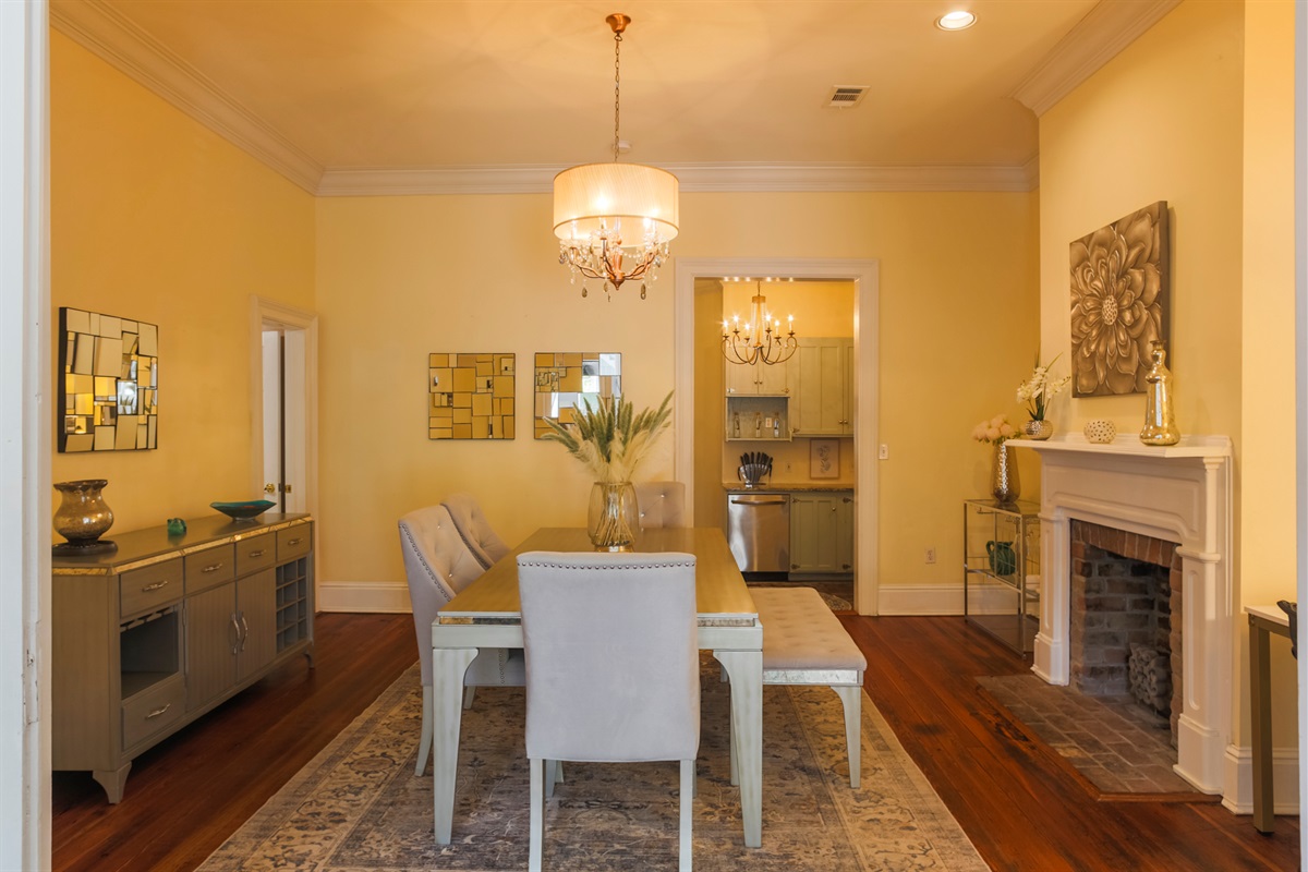 Gather around the dining table that comfortably seats six—perfect for meals or game nights.