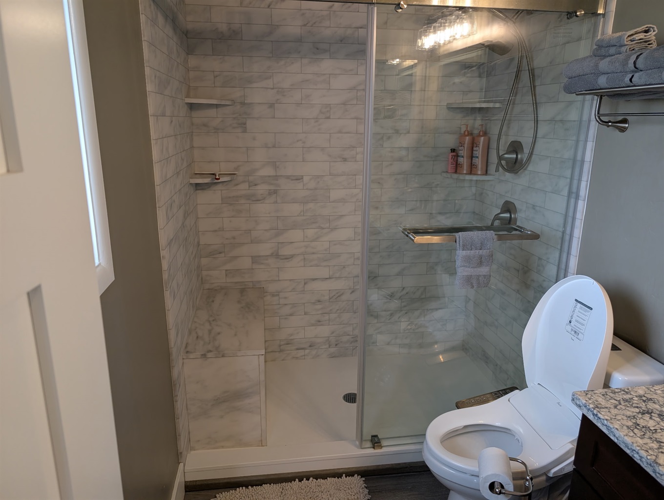 Master Bathroom with step free access to shower