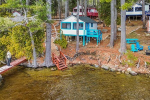 Aerial point o fview thats shows path and stairs that takes you to the lake