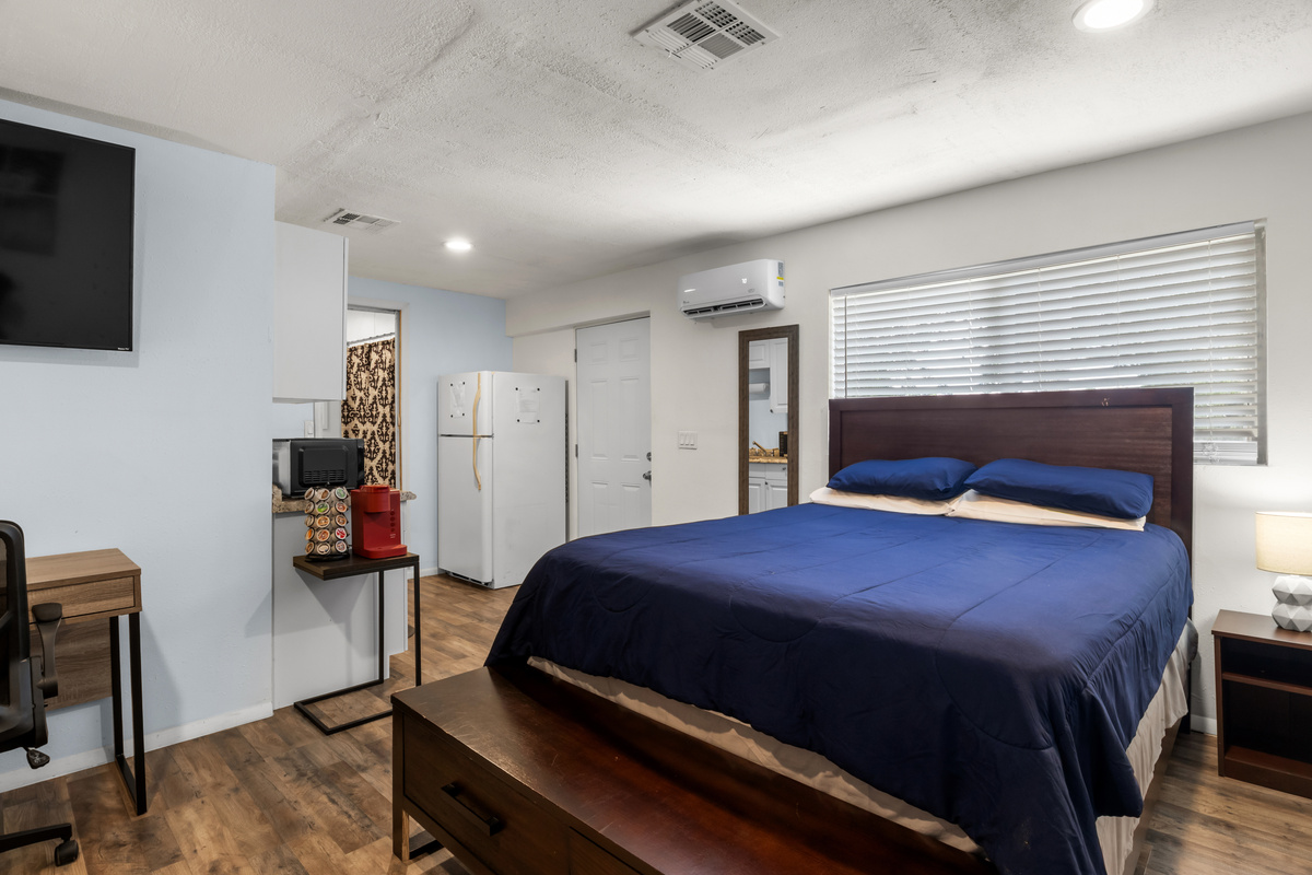 Bedroom connects directly to the kitchenette.