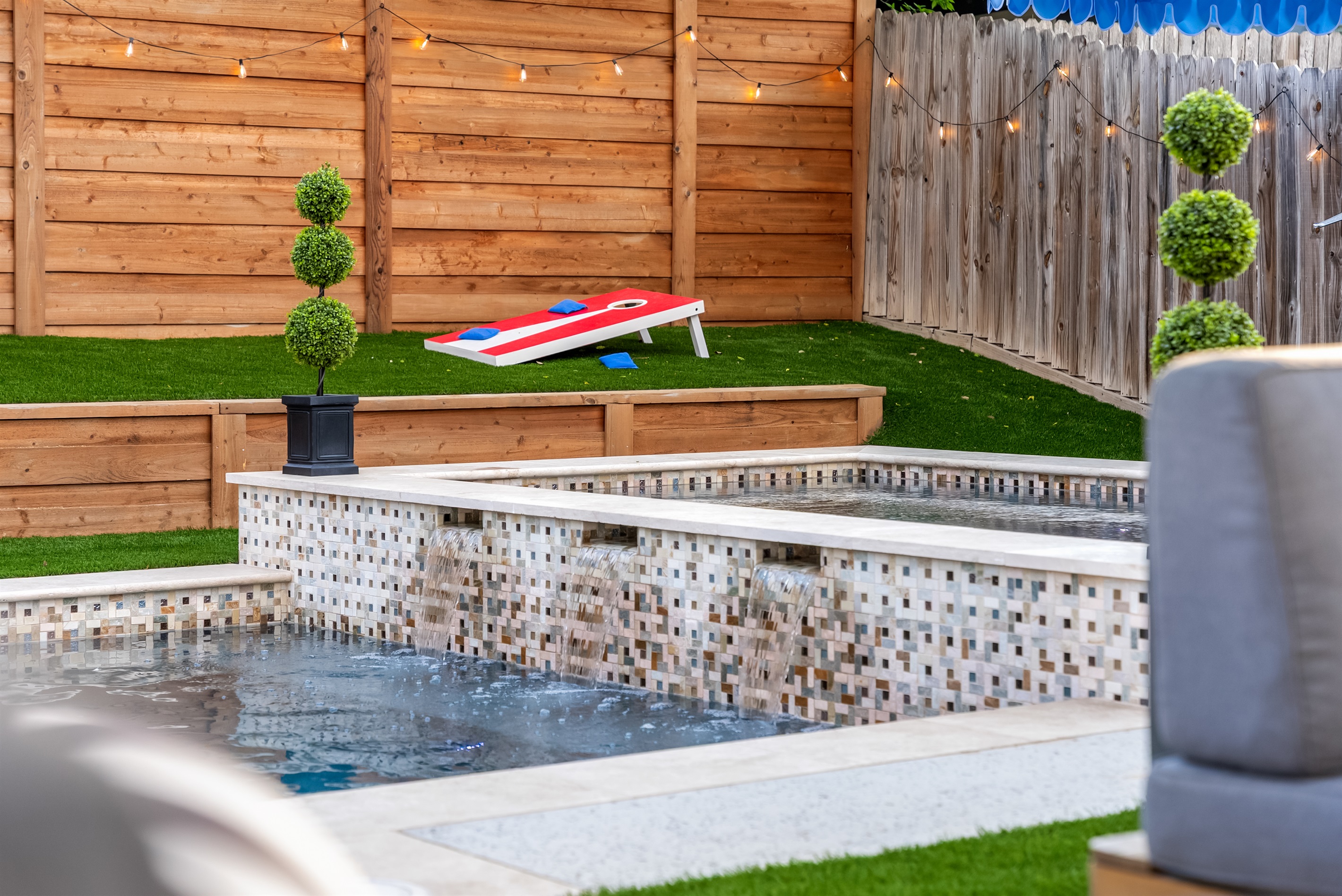 Waterfall from spa into pool