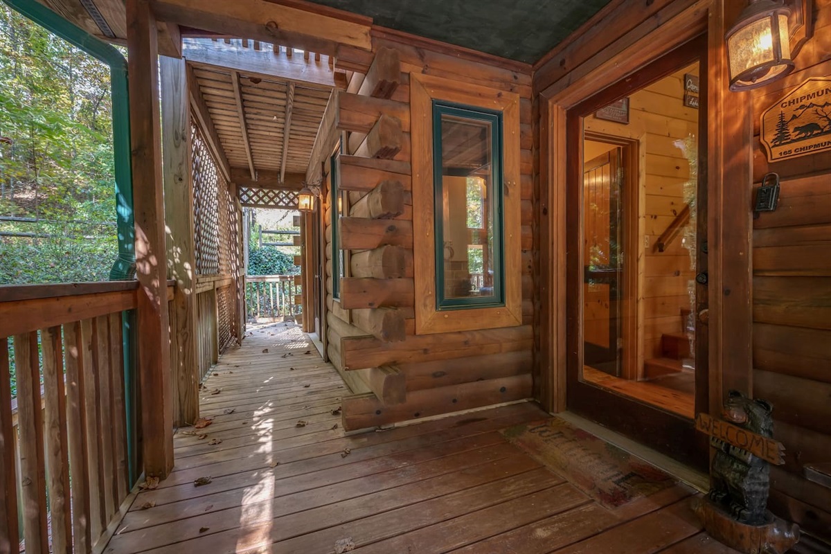 Walkway to the front door from parking area. Parking for up to 6 cars.