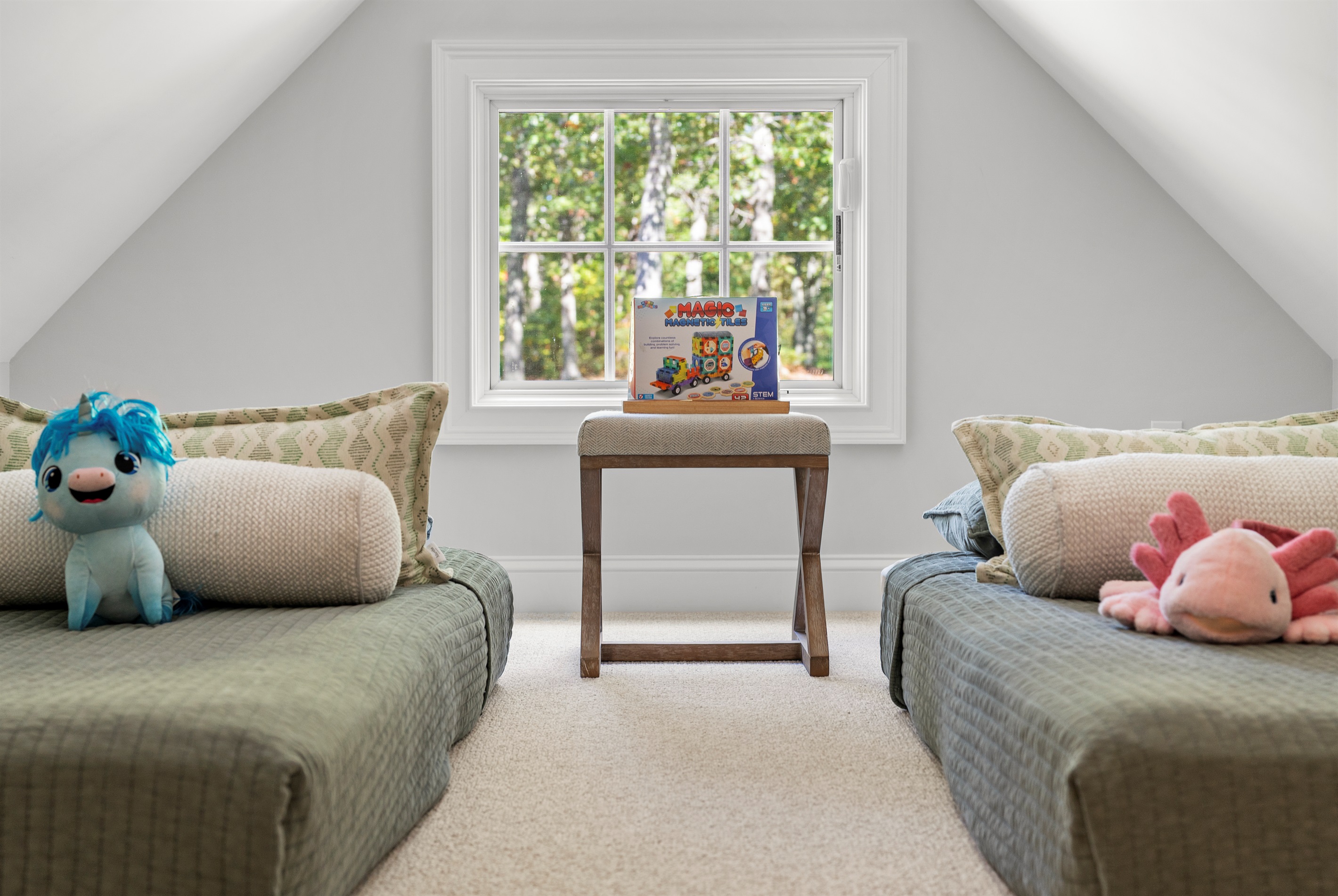 With a queen and two twin beds, this bedroom  offers space and flexibility for guests of all ages.